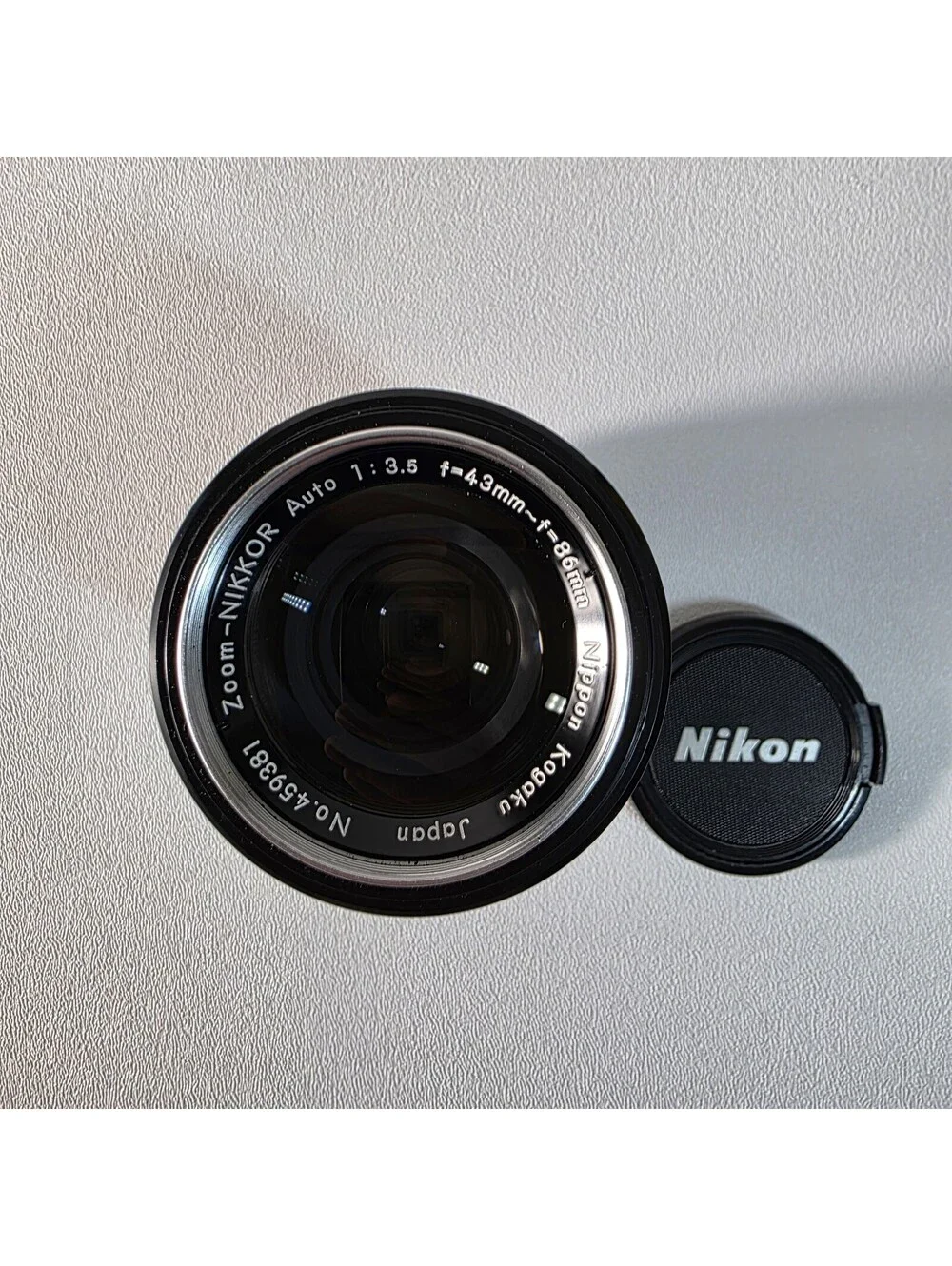 Clean Nikon Zoom-Nikkor Auto f/3.5 43mm-86mm Non-AI Camera Lens w/ Nikon Caps